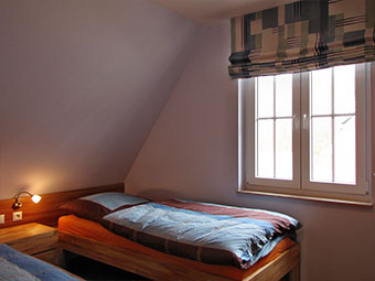 Ein weiteres Schlafzimmer im Obergeschoss